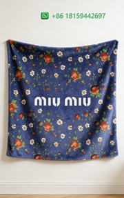 Miumiu Throw Blankets